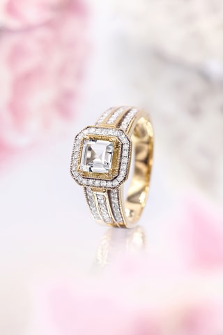 Anillo Remban - Oro amarillo, diamantes y topacio blanco