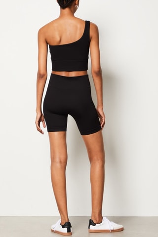 Top sportivo asimmetrico Capsule Active - Nero