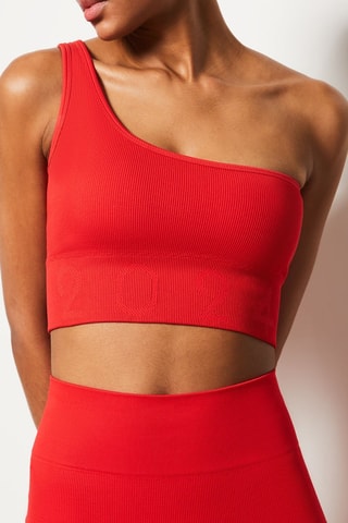 Top sportivo asimmetrico Capsule Active - Rosso 
