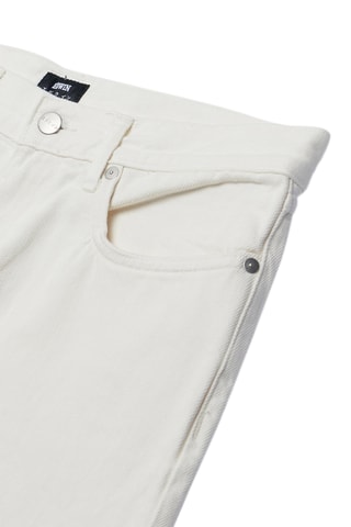 Vaquero slim fit de algodón orgánico - Blanco