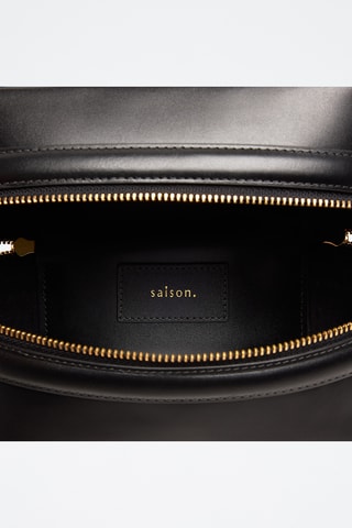 Borsa a mano in pelle di vitello Maëlle - Nero