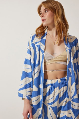 Kimono e pantaloni palazzo a vita alta