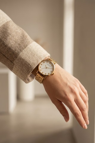 Reloj de cuarzo de acero - Dorado