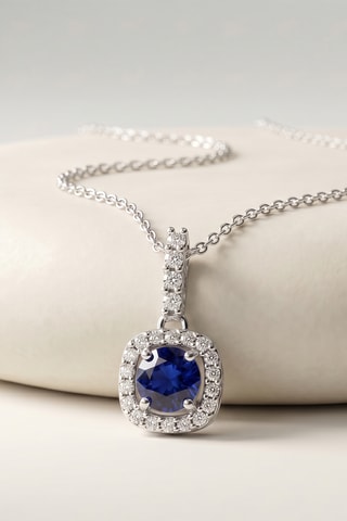 Pendentif - Or blanc, topazes et saphir