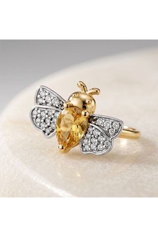 Bague - Or jaune, topazes et citrine