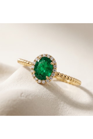 Bague - Or jaune, diamants et émeraude