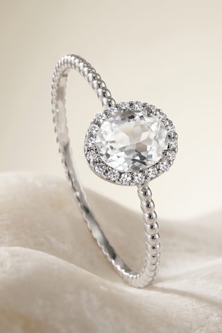 Bague - Or blanc, diamants et topaze