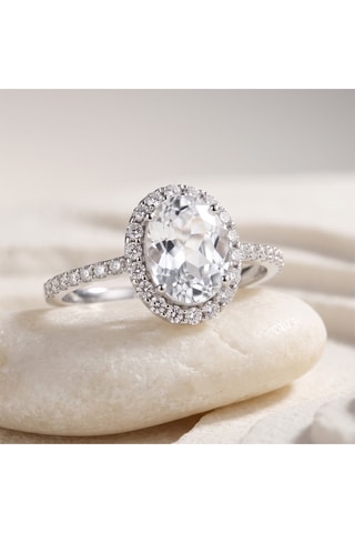 Bague - Or blanc, diamants et topaze