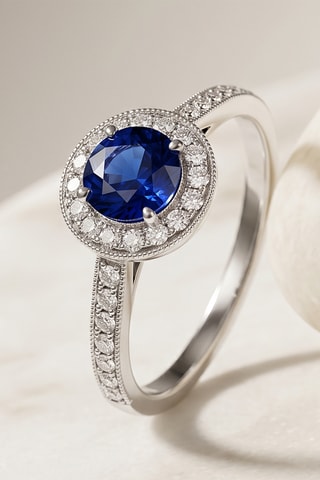 Bague - Or blanc, topazes et saphir