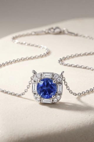 Collier - Or blanc, diamants, saphir et topazes