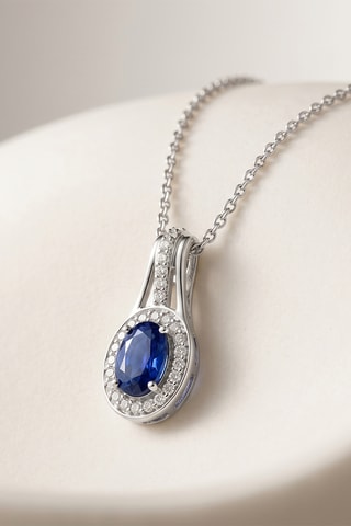 Collier - Or blanc, topazes et saphir