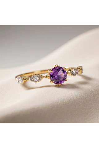 Bague - Or jaune, topazes et améthyste