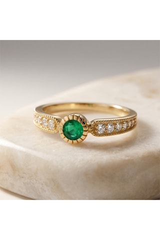 Bague - Or jaune, topazes et émeraude