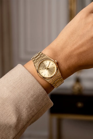 Montre à quartz en acier - Doré