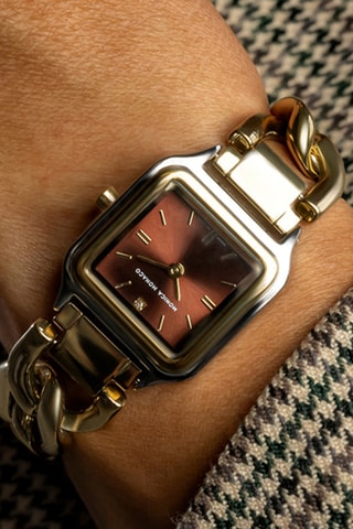Montre à quartz en acier et diamant - Doré