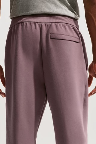 Pantalon de fitness Nike 24.7 ImpossiblySoft - Mauve