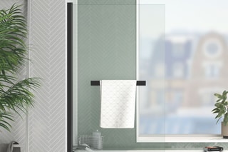 Pare baignoire rabattable en verre trempé avec porte-serviette Essentiel - 70 x 120 cm