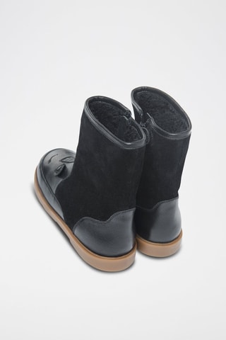 Bottines fourrées à oreilles en cuir Noir