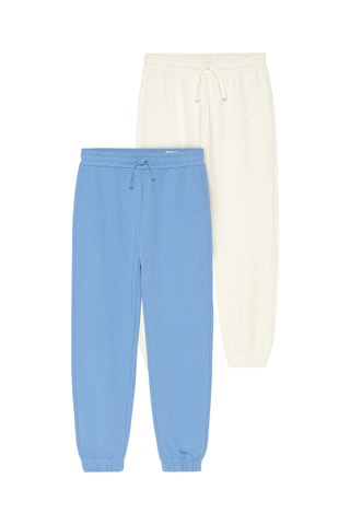 2 pantaloni sportivi - Celeste ed ecrù