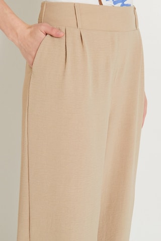 Pantaloni larghi a vita alta - Beige