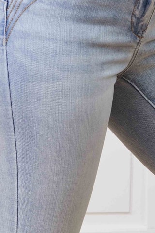 Jeans slim a vita alta - Celeste