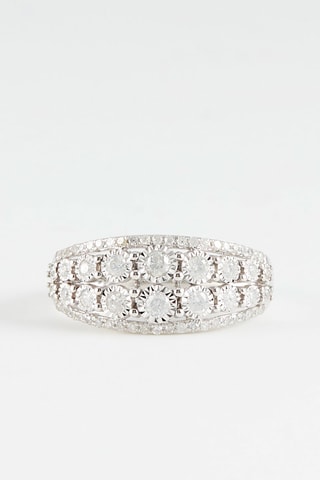 Anillo 
Oro blanco y diamantes