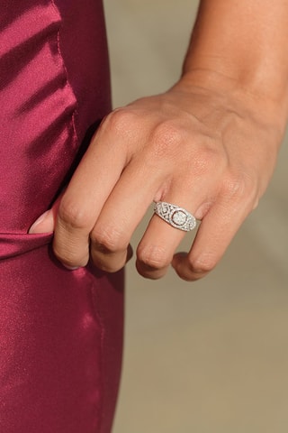 Anillo Poema - 
Oro blanco y diamantes naturales