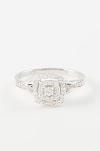 Anillo - 
Oro blanco y diamantes