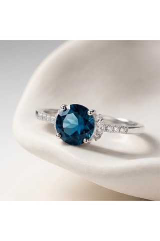 Anillo - Oro blanco, diamantes y topacio