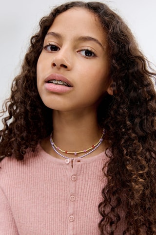 Pull-over maille côtelée boutons - Rose