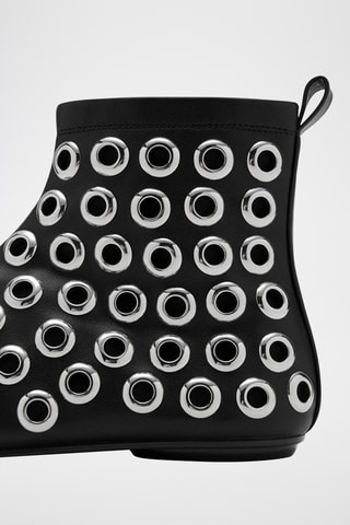 Bottines effet cuir à œillets - Noir