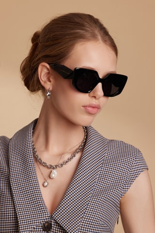 Lunettes de soleil polarisées femme Eleganza - Catégorie 3 - Noir