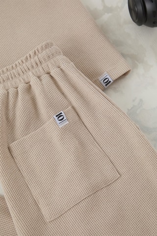 Camiseta oversize y pantalón de chándal - Beige