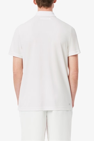Polo Lacoste Tennis x Novak Djokovic regular fit - Blanco