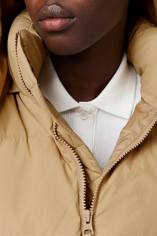 Chaqueta acolchada con capucha relaxed fit - Beige