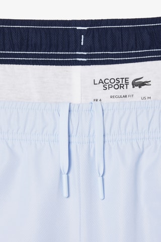 Pantalón corto de tenis regular fit - Celeste y azul marino