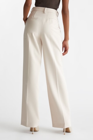 Pantalón palazzo - Beige